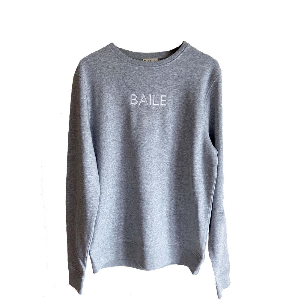 Grey organic unisex crew neck jumper. Made from 80% organic cotton and 20% recycled polyester. Hand dyed to create bespoke designs. Irish owned sustainable brand